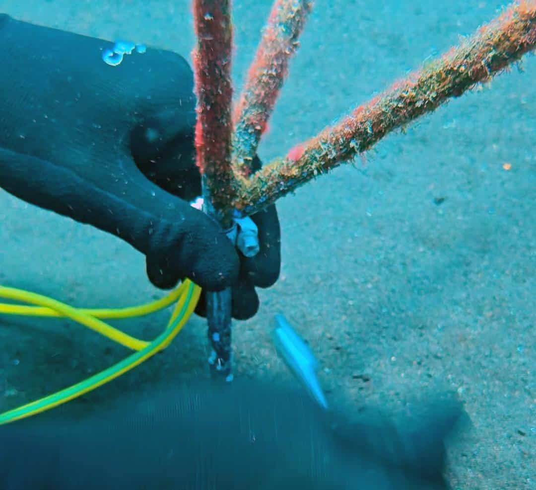 Hooking up the electric current to the rebar of metallic structures in Bali