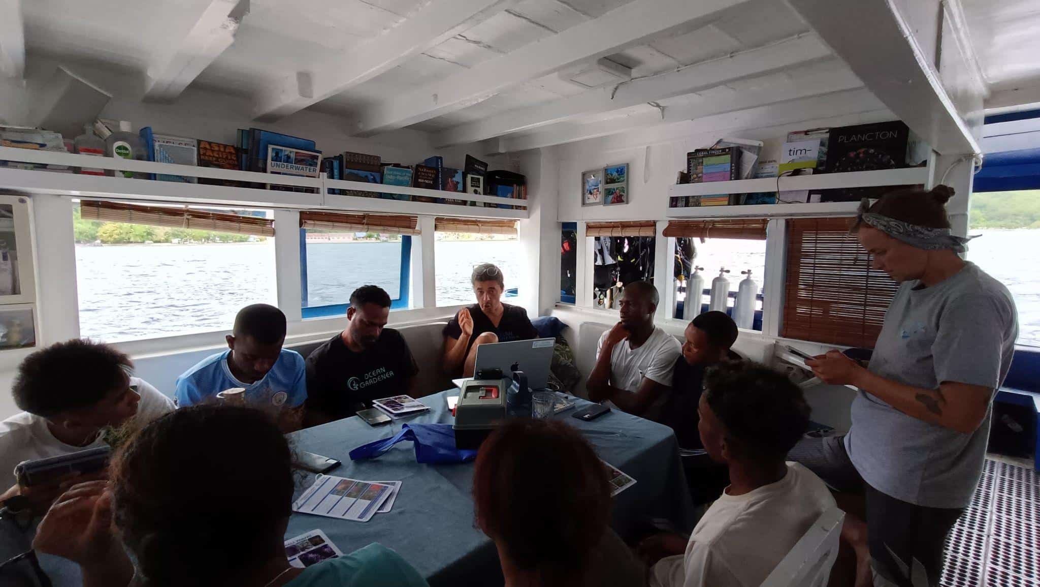 Coral restoration students in Raja Ampat revising coral biology, morphology and identification.