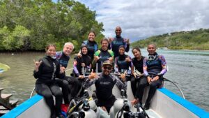 Scuba divers with coral restoration class in Bali