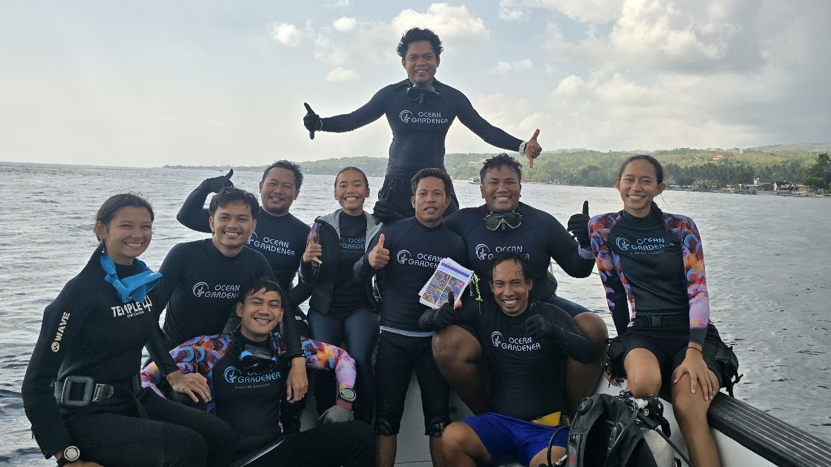 TFCCA Batch 1 trainees suited up aboard the boat before a coral identification dive near Ped, Nusa Penida